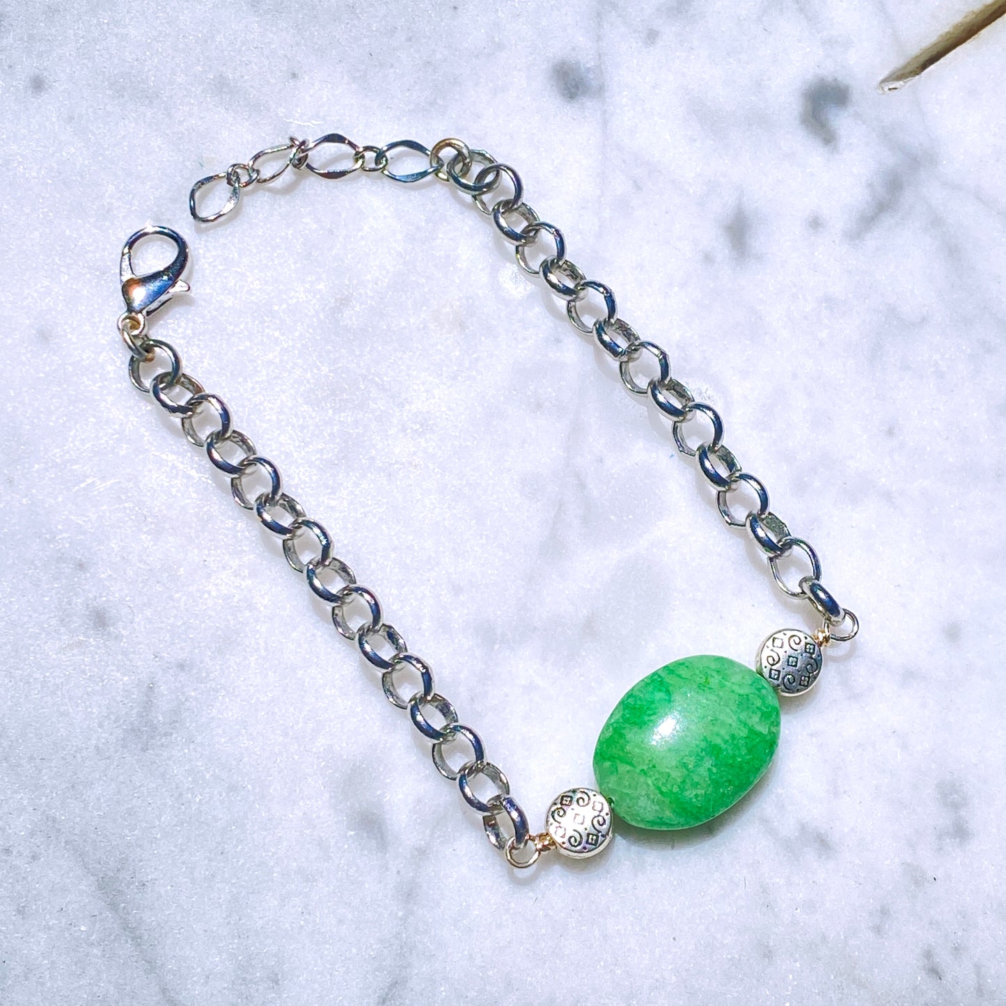 Genuine Emerald gemstone bracelet with silver chain.