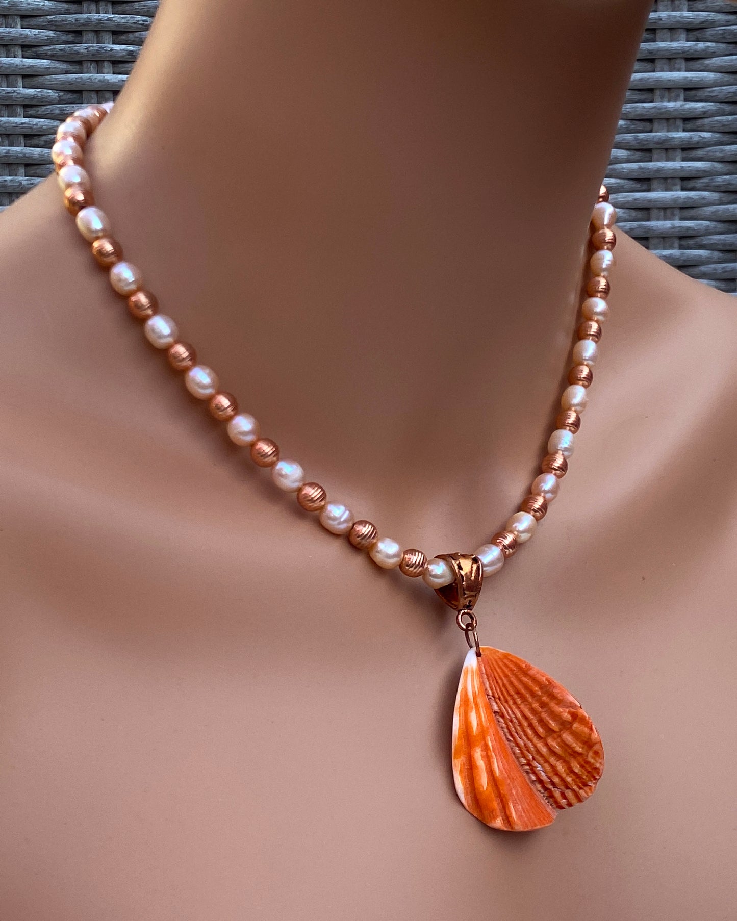 Shell Pendant on Pearl Necklace