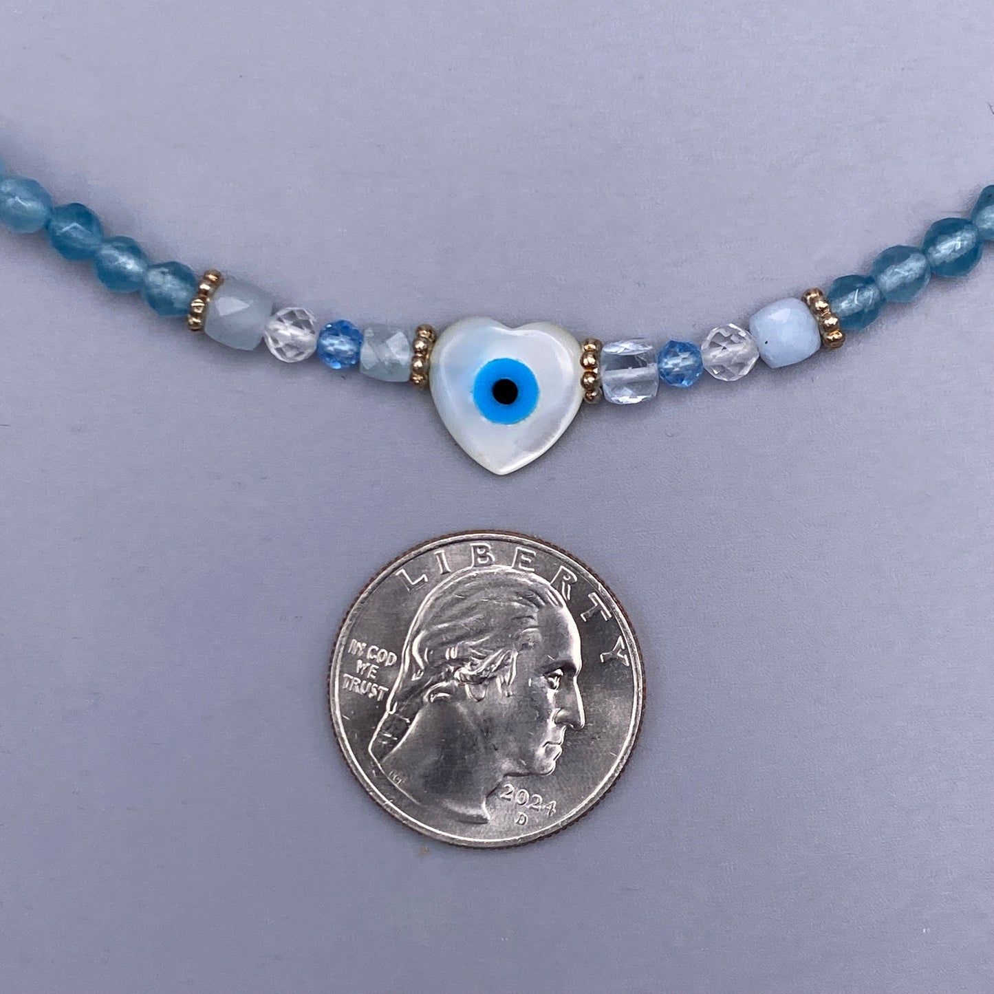 Aquamarine, Blue Topaz, and Evil Eye Necklace