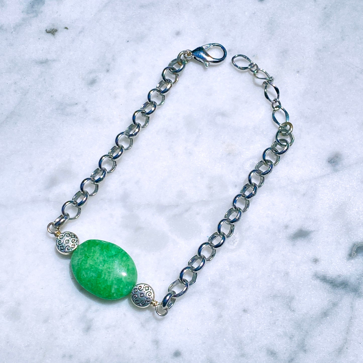 Genuine Emerald gemstone bracelet with silver chain.