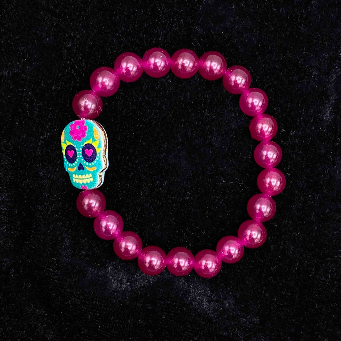 Metal Skull on gemstone beaded bracelet