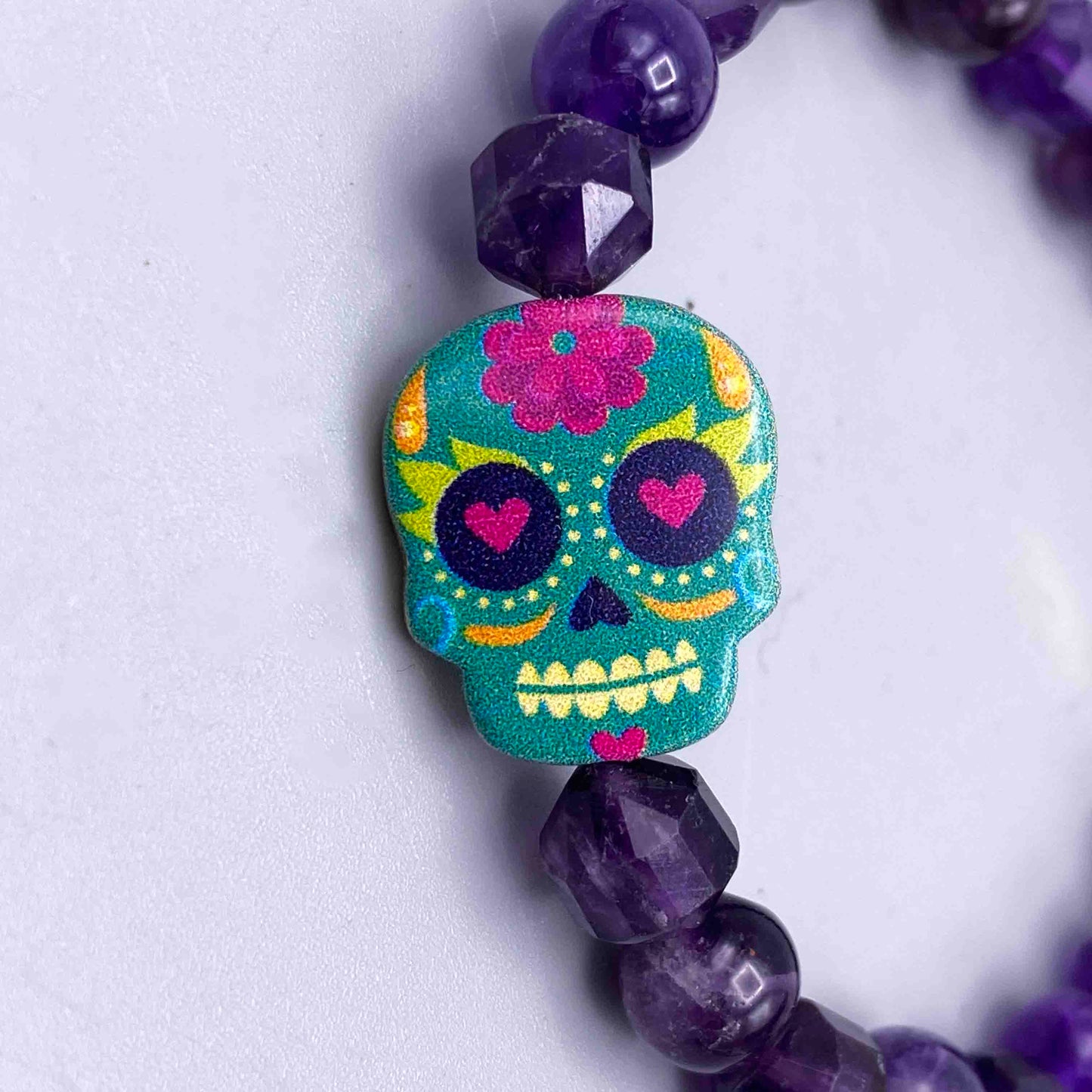 Metal Skull on gemstone beaded bracelet