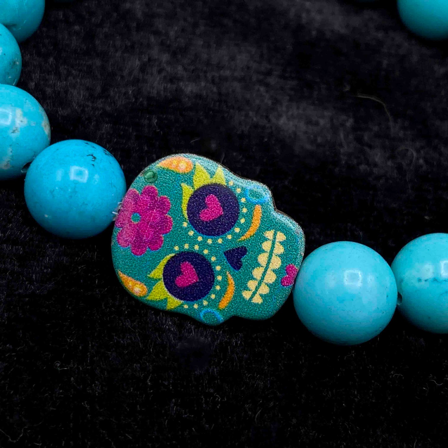 Metal Skull on gemstone beaded bracelet