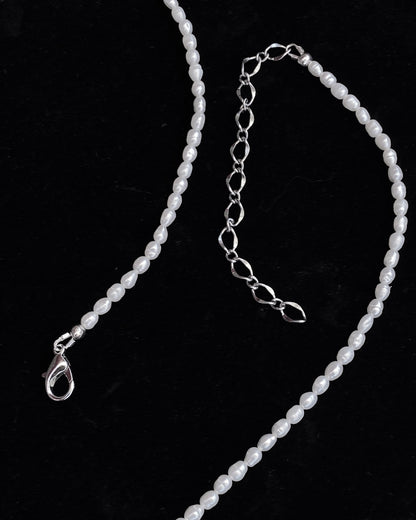 Pearl beaded necklace with silver plated Horseshoe pendant