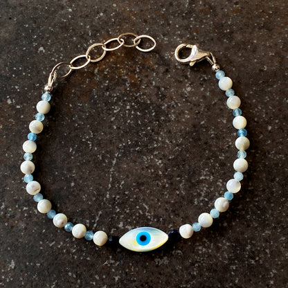 Women's mother of pearl, Blue Sapphire, and Aquamarine Evil Eye Gemstone silver Clasp Bracelet
