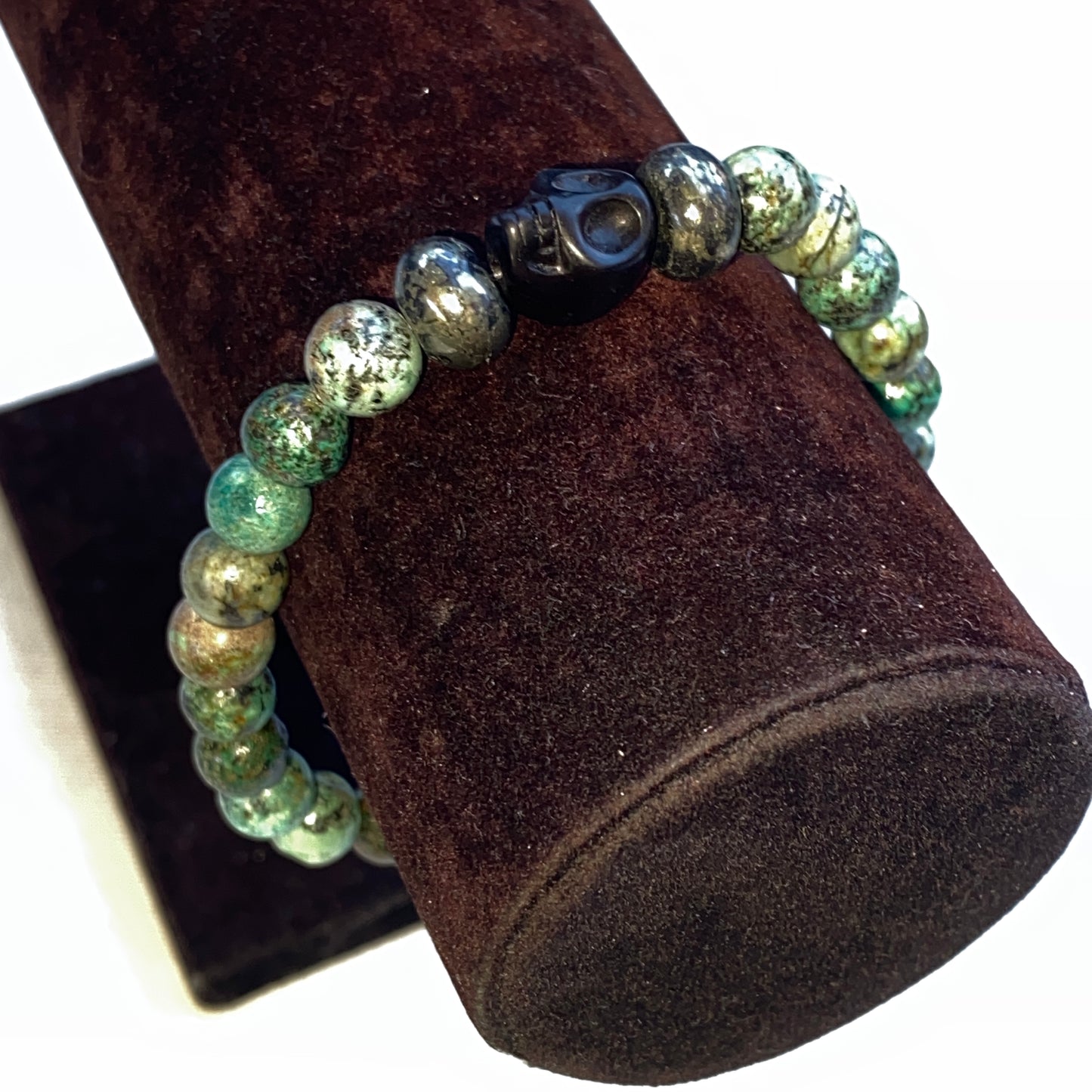 African Turquoise, Pyrite, and Howlite Skull Men’s Stretch Bracelet