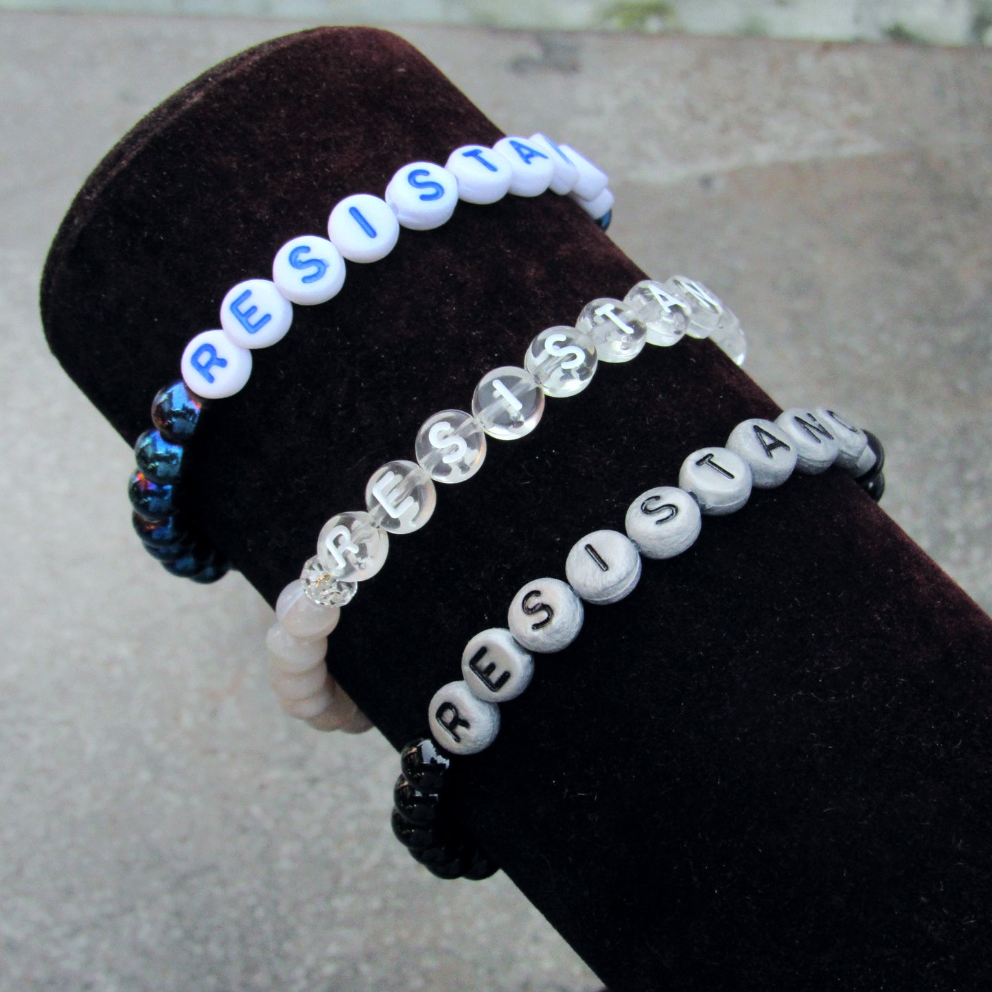 RESISTANCE bracelets in various sizes and gemstones