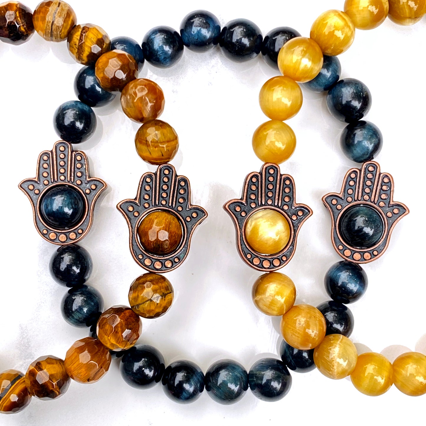 Men's Tiger Eye gemstone and copper Hamsa bracelet.