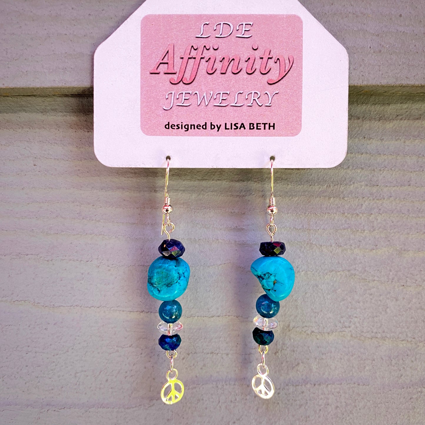 Turquoise Gemstone drop Earrings with Sapphire, Gemstones and sterling silver peace sign or feather