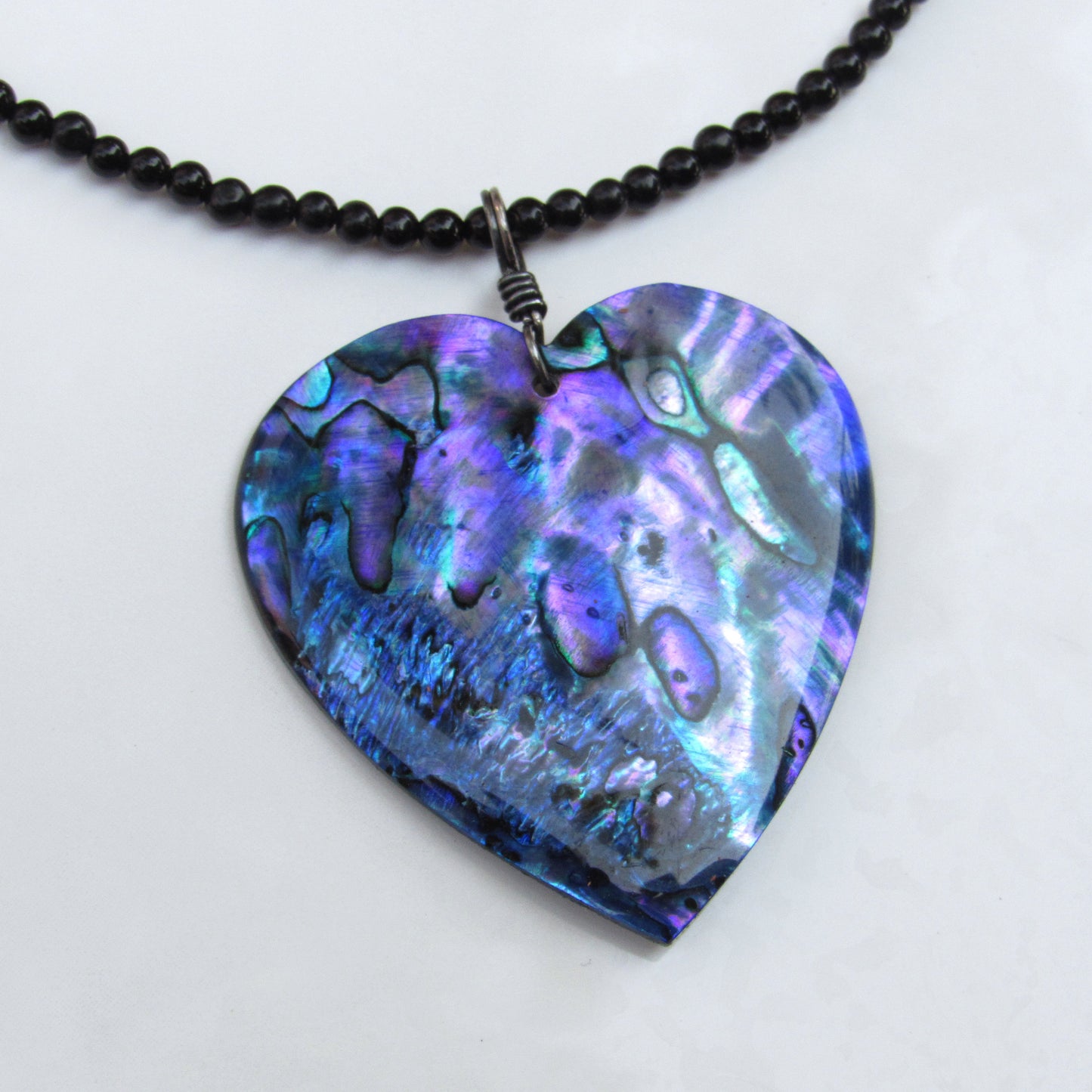 Abalone Shell Heart Pendant on Onyx beaded Necklace
