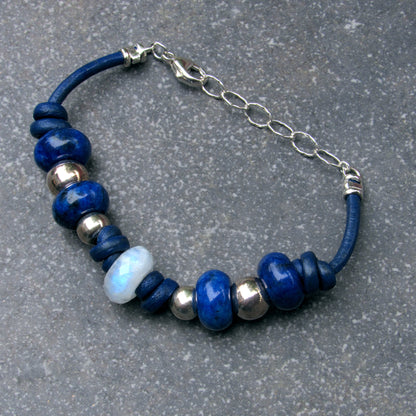 Moonstone center stone with Lapis Lazuli gemstones, and Sterling Silver leather bracelet