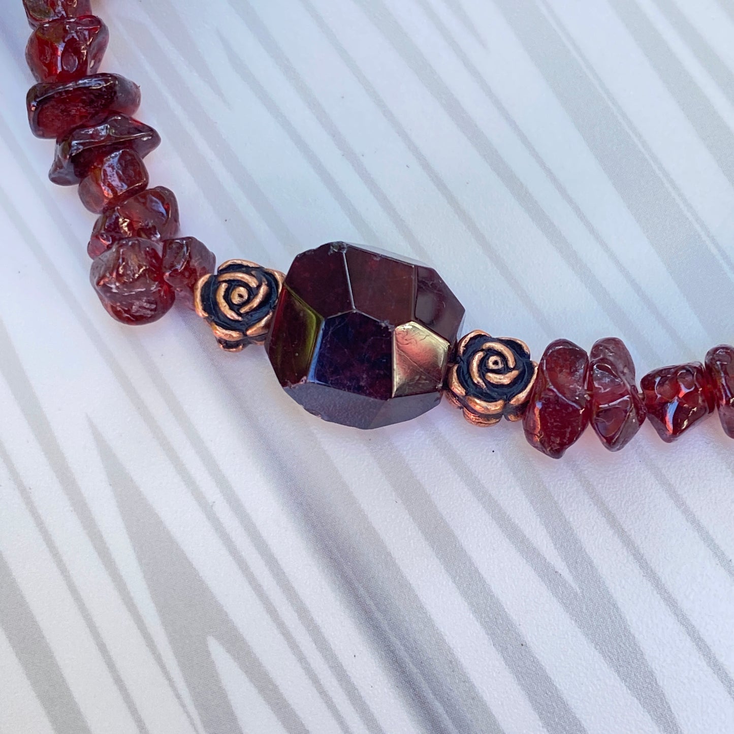 Garnet gemstone and Copper Rose clasp Bracelet
