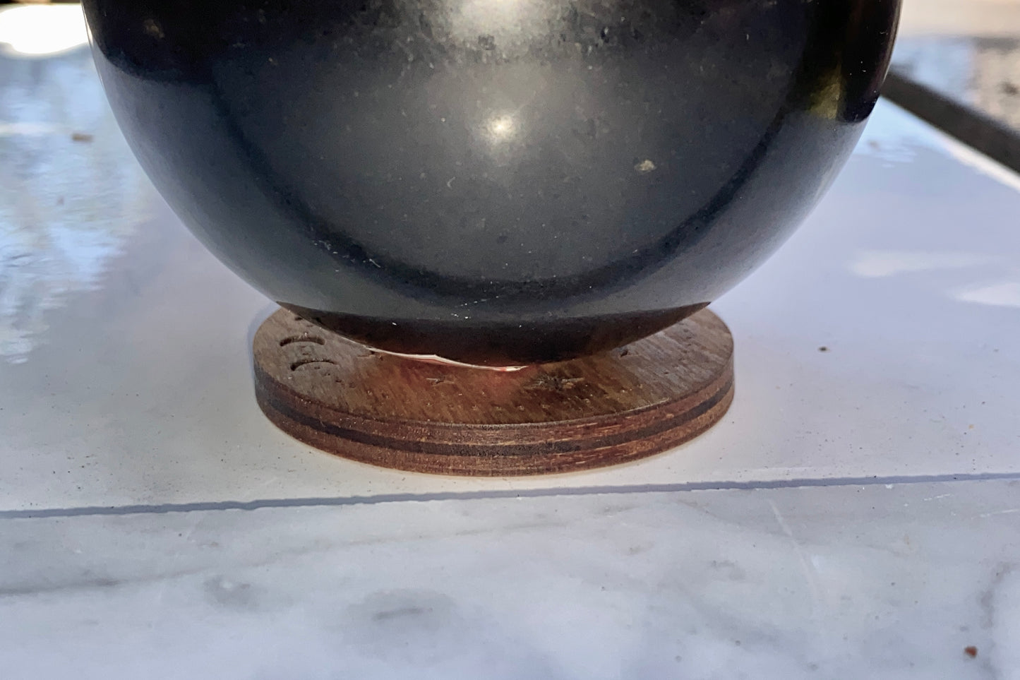 Wooden stand for gemstone sphere, crystal ball