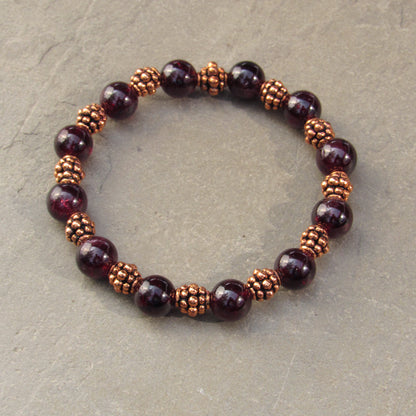 Garnet gemstones with copper stretch bracelet