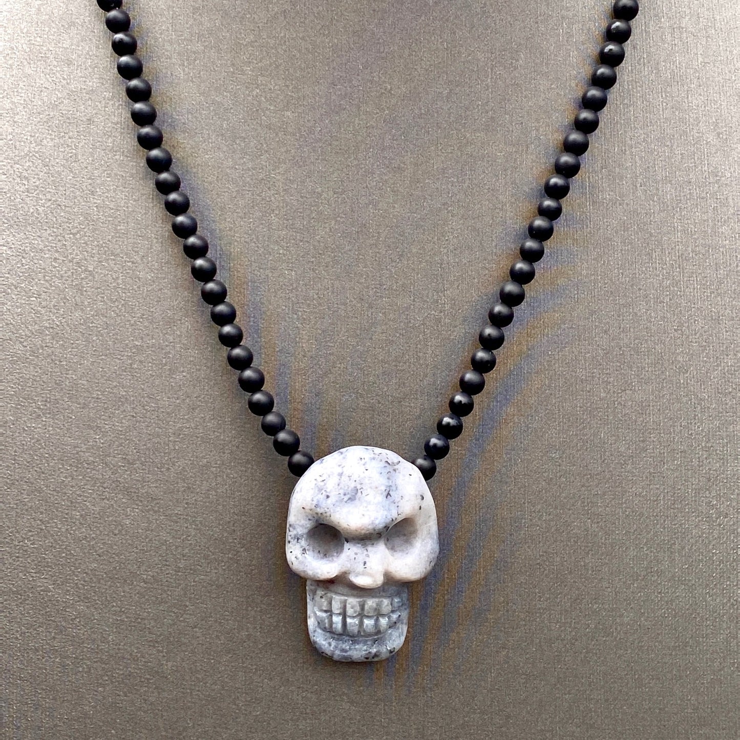 Ice Blue Agate skull w/ Onyx and Sterling Silver Clasp
