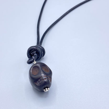 Leather and Gemstone Skull necklaces with Sterling Silver