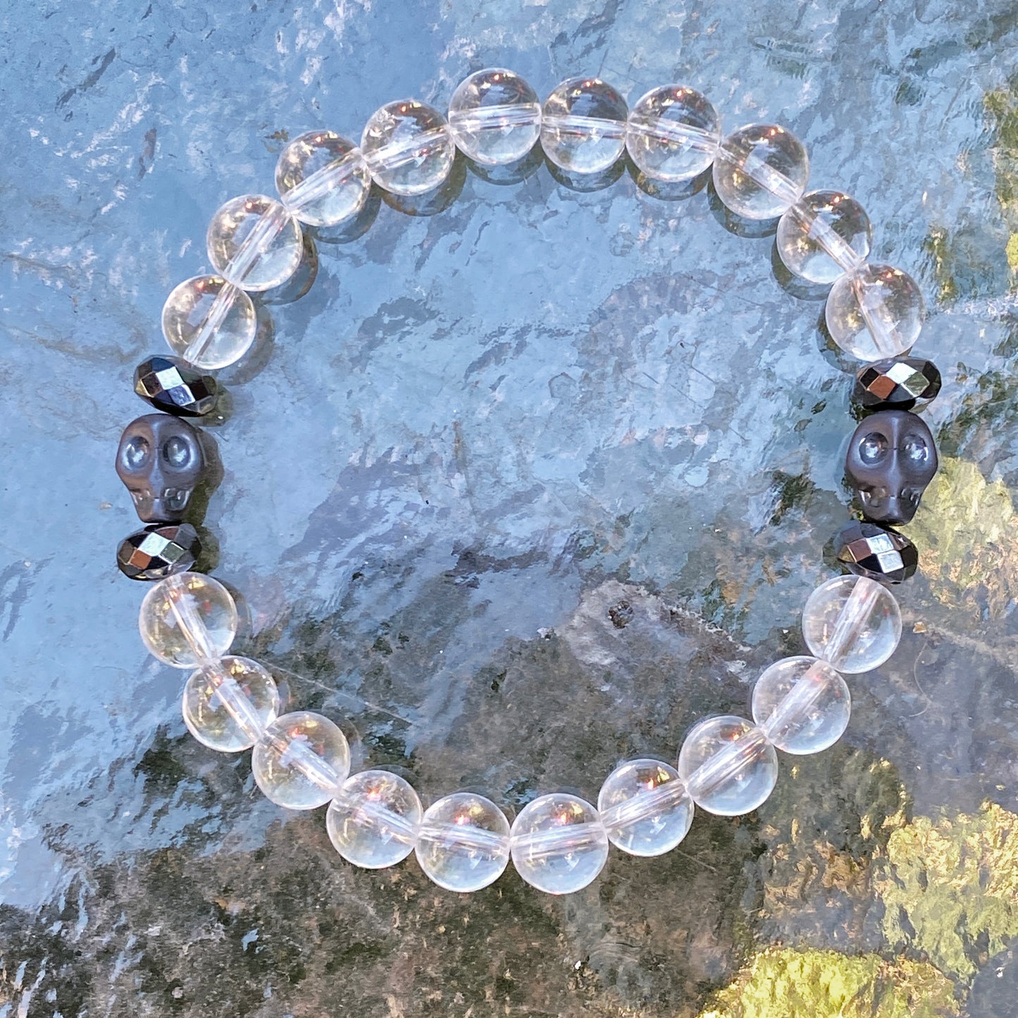 Clear Quartz gemstone and Hematite Skull Men’s Stretch Bracelet