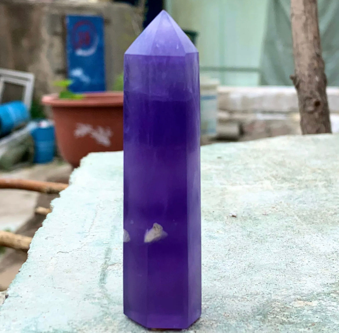 Natural purple fluorite gemstone tower point aura wand