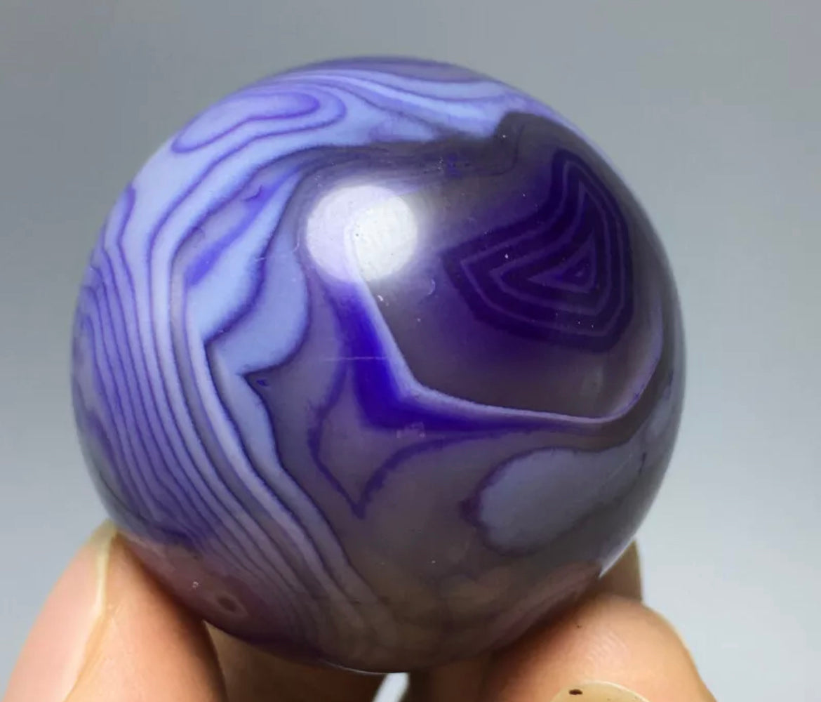 Purple hot sale onyx stone