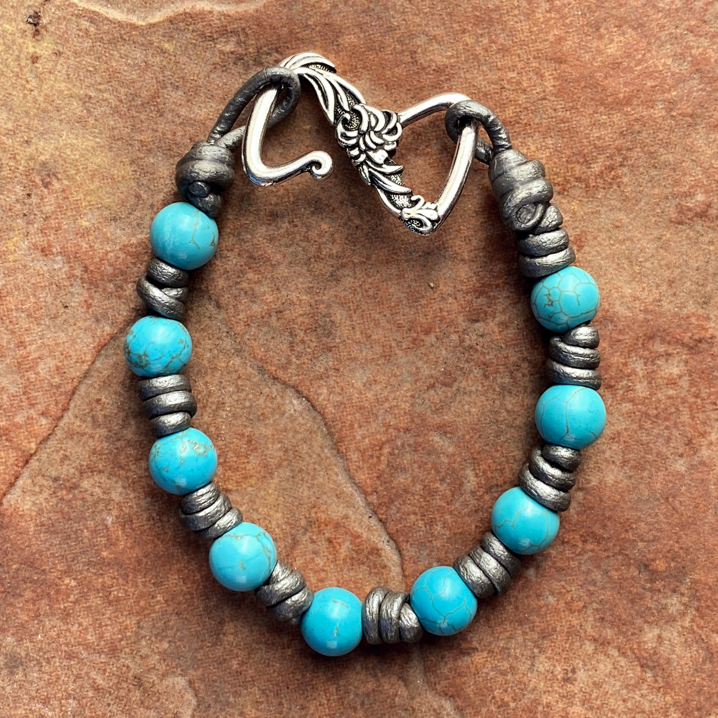 Women’s hand knotted Leather and Metal Howlite Gemstone bracelet