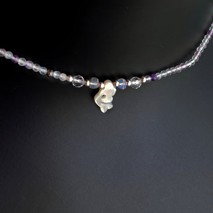 Mother of pearl mermaid on rainbow fluorite with Ethiopian opals, white topaz and sterling silver.
