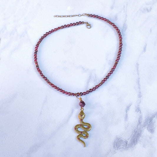 Garnet gemstone and Brass Snake pendant Necklace