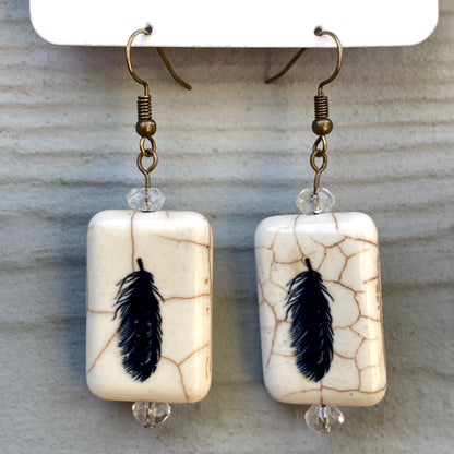 Painted Feather earrings with citrine gemstones.