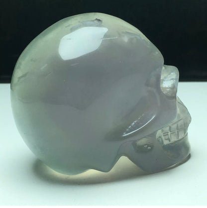 Exquisite fluorite gemstone carved Skull