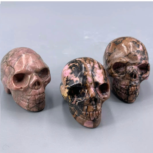 Natural Rhodonite gemstone Skull