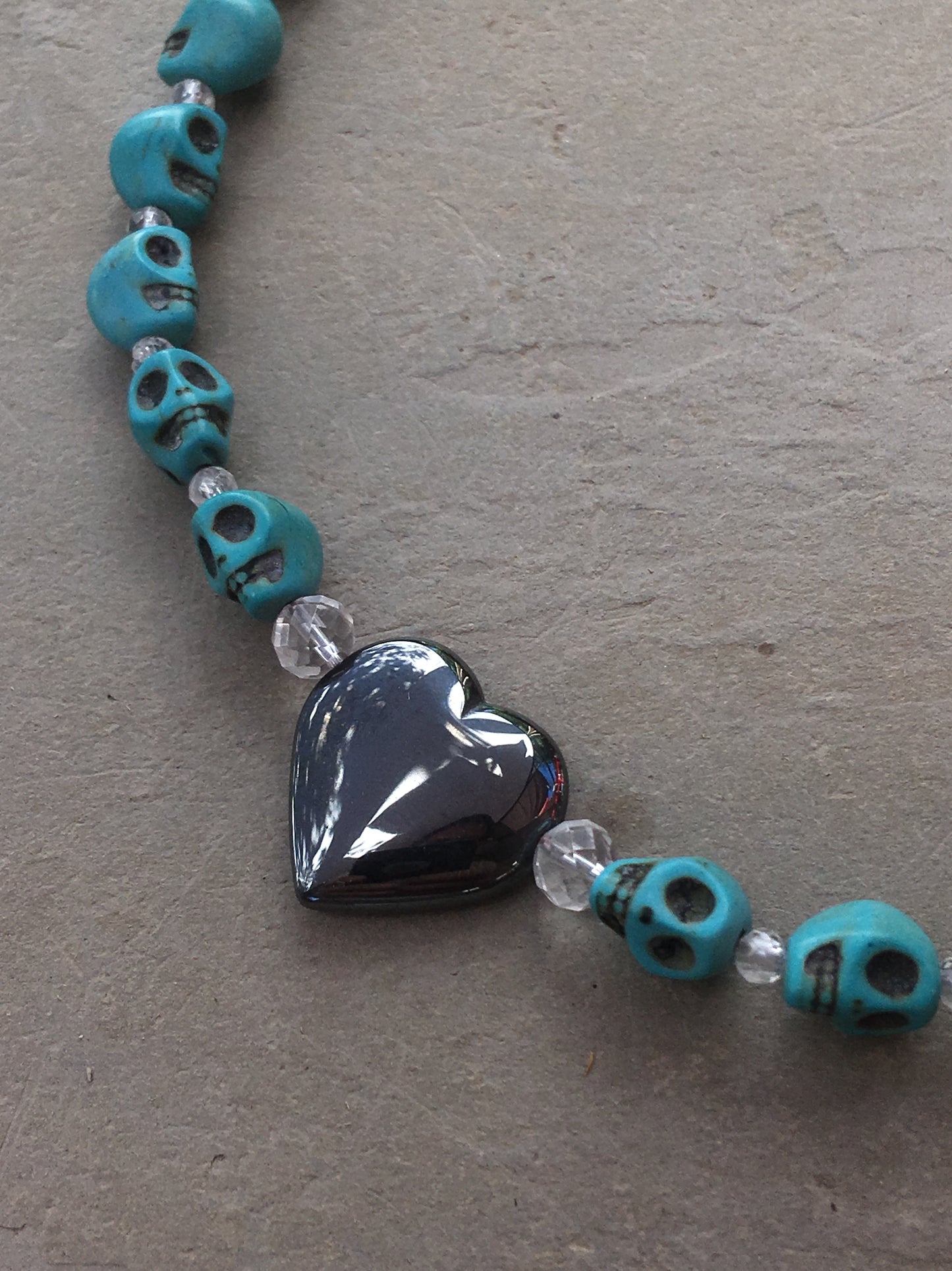 Women's Light Blue Skull & Gemstone Heart necklace