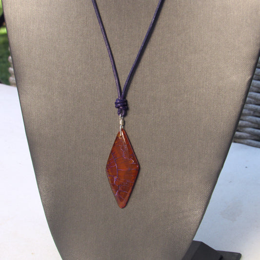 Dragon’s Vein Agate gemstone, Sterling Silver, and Leather