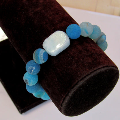 Blue Agates, Aquamarine gemstone, and mother of Pearl Evil Eye Bracelet