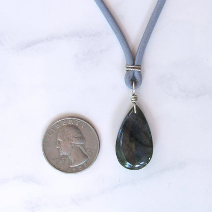 Blue Flame Labradorite gemstone Hand Wrapped on Leather W/ Sterling Silver