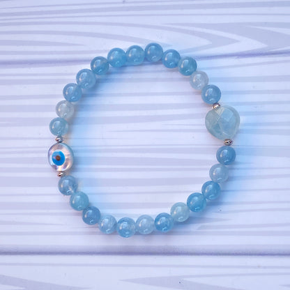 Aquamarine with Mother of Pearl Evil Eye stretch Bracelet