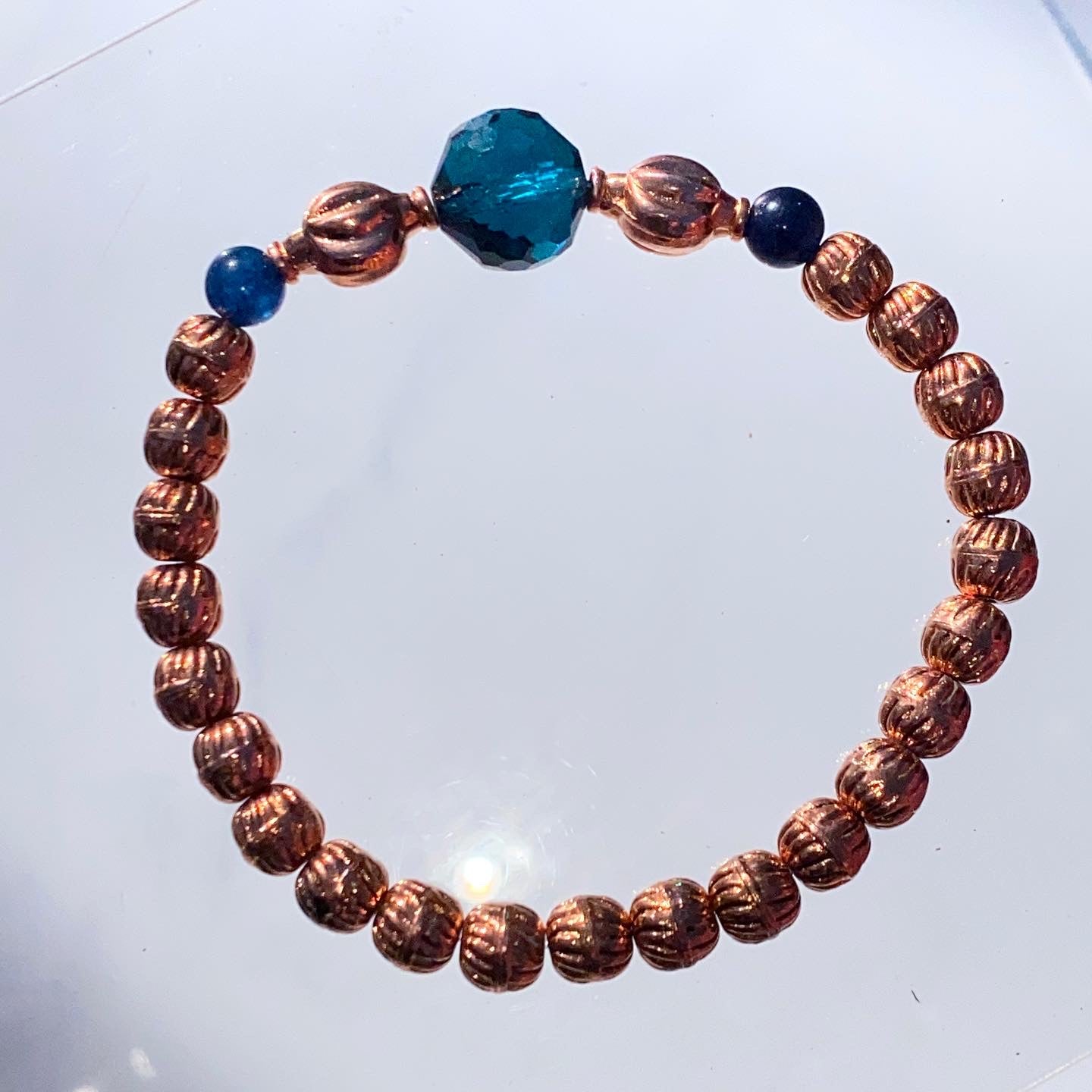 Blue tourmaline gemstone and copper stretch bracelet
