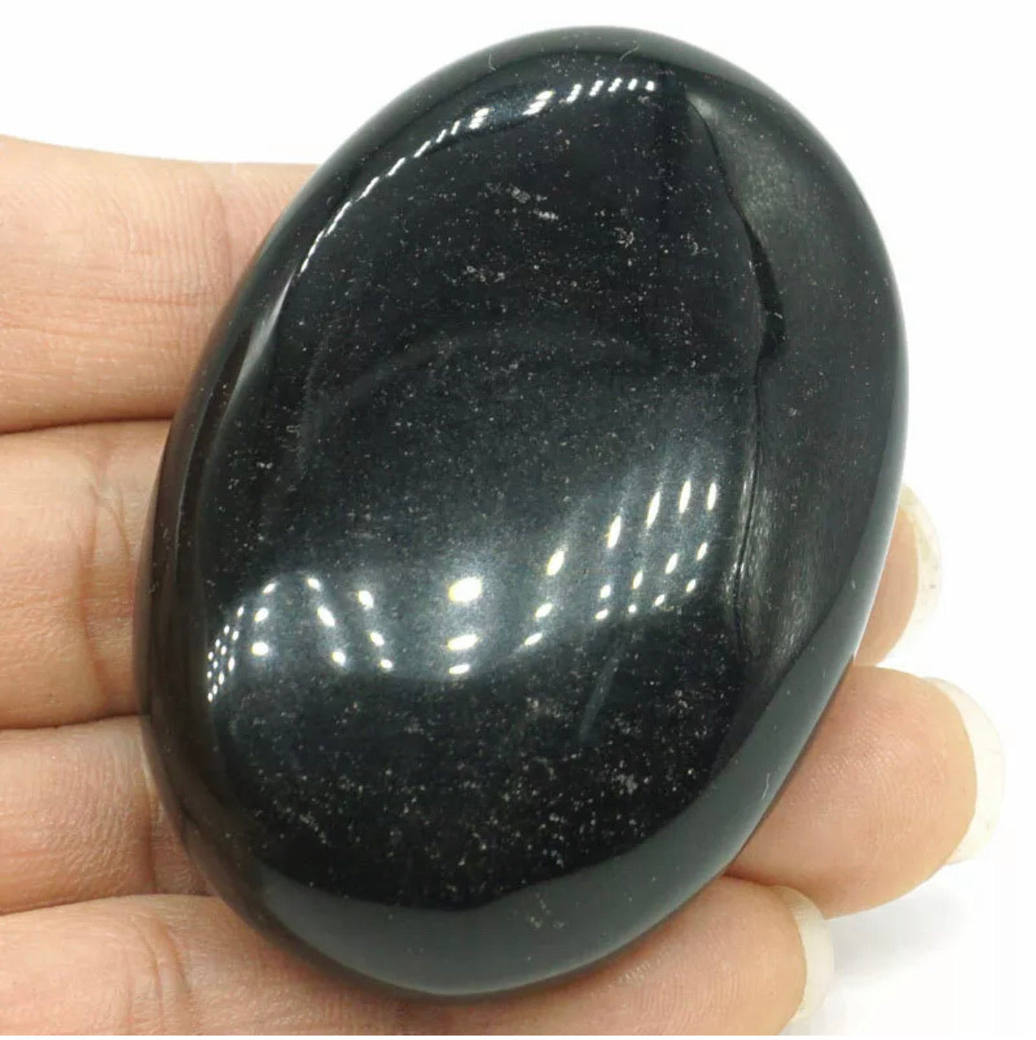 Natural black obsidian gemstone palm stone