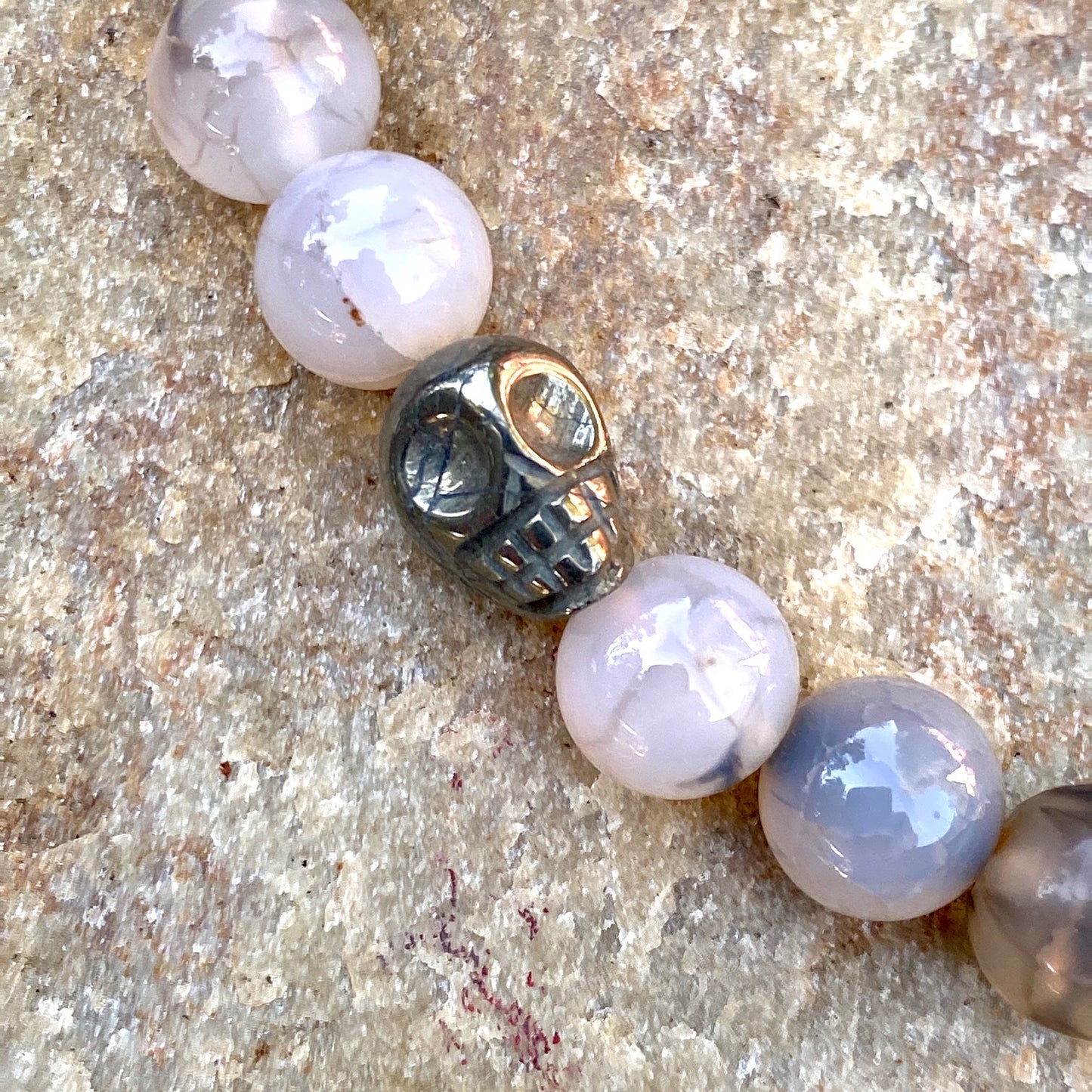 Dragon’s Vein Agate and Pyrite Skulls Stretch Bracelet