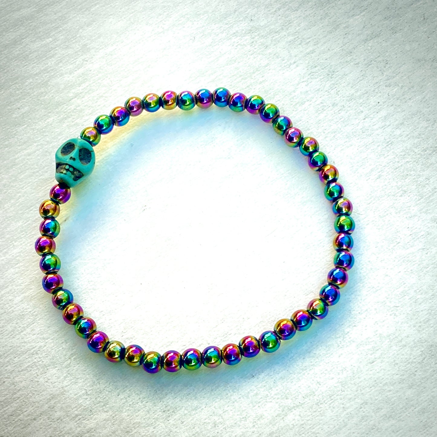 Rainbow Hematite gemstone with Howlite Skull bracelet