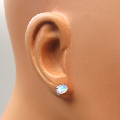 Opal gemstones and sterling silver stud earrings