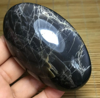 Natural grey moonstone healing palm stone