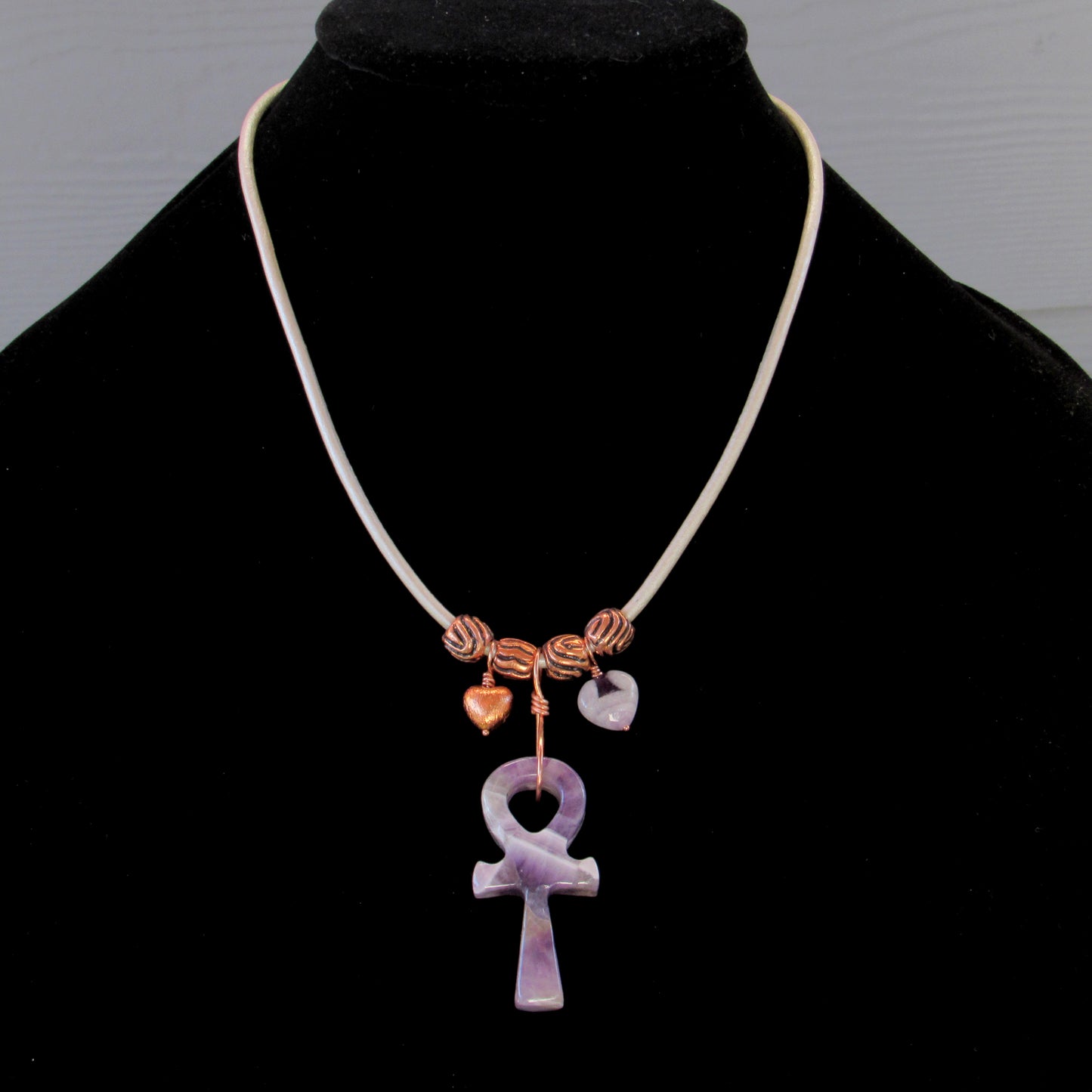 Amethyst gemstone carved Ankh pendant with copper on leather necklace