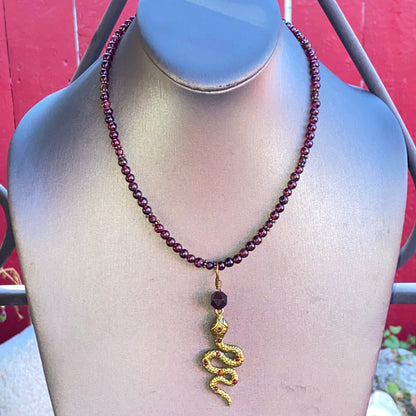 Garnet gemstone and Brass Snake pendant Necklace