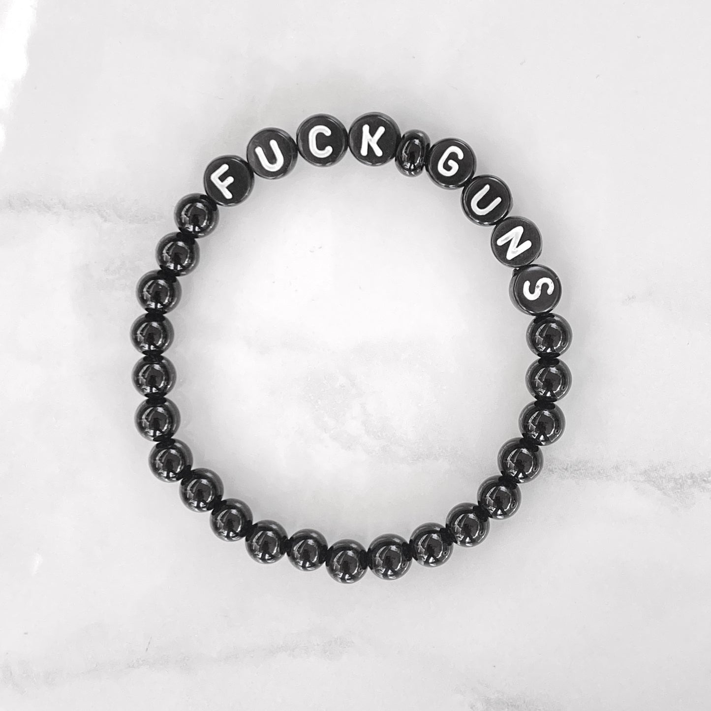 Black Onyx gemstone "Fuck Guns" stretch Bracelet