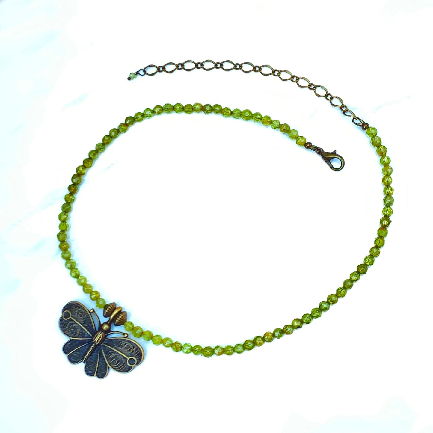 Peridot gemstone and Brass Butterfly Necklace