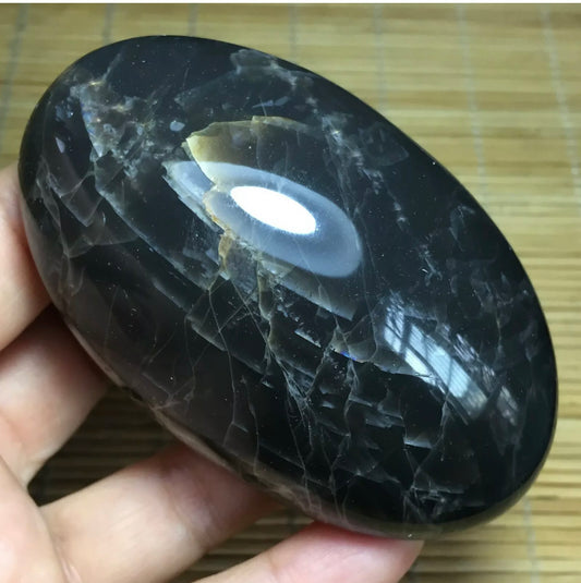 Natural grey moonstone healing palm stone