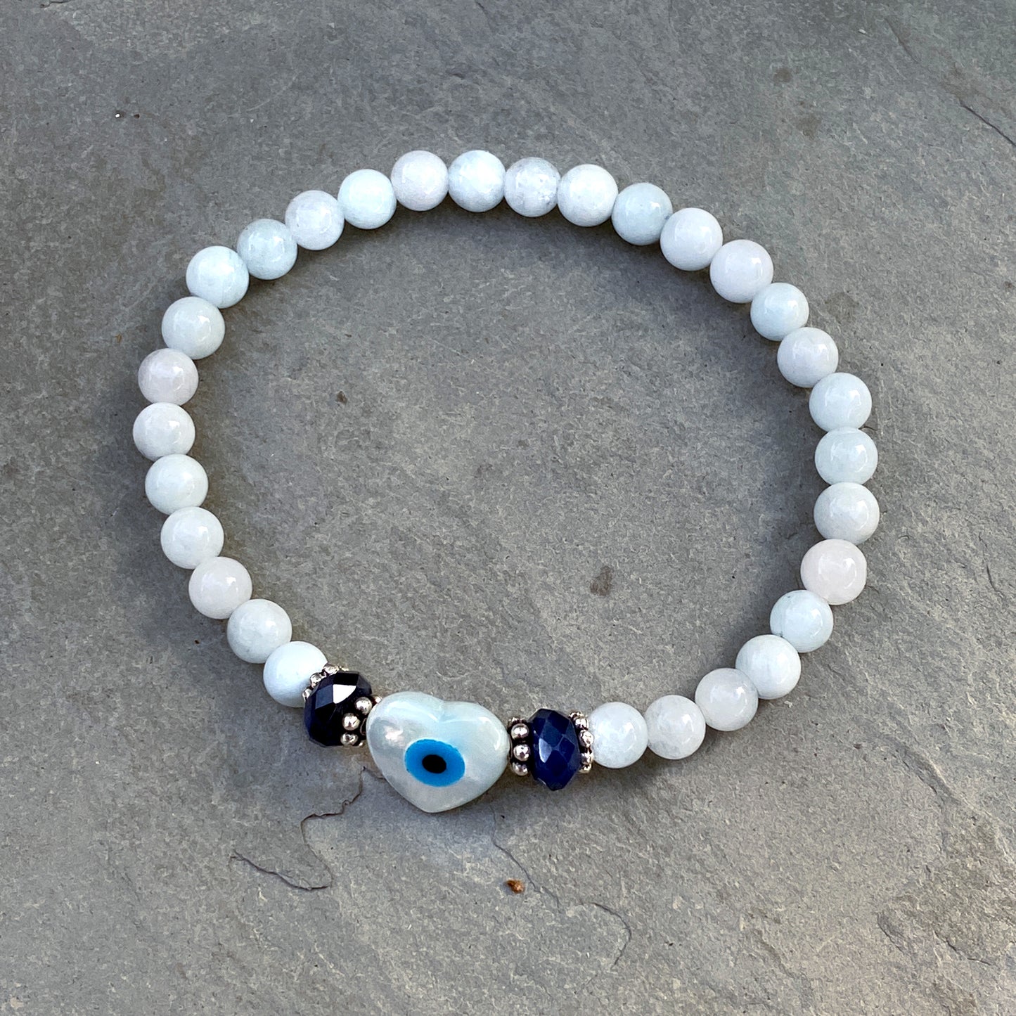 Mother of Pearl, Aquamarine gemstones, and Blue Sapphires with Sterling Silver bracelet