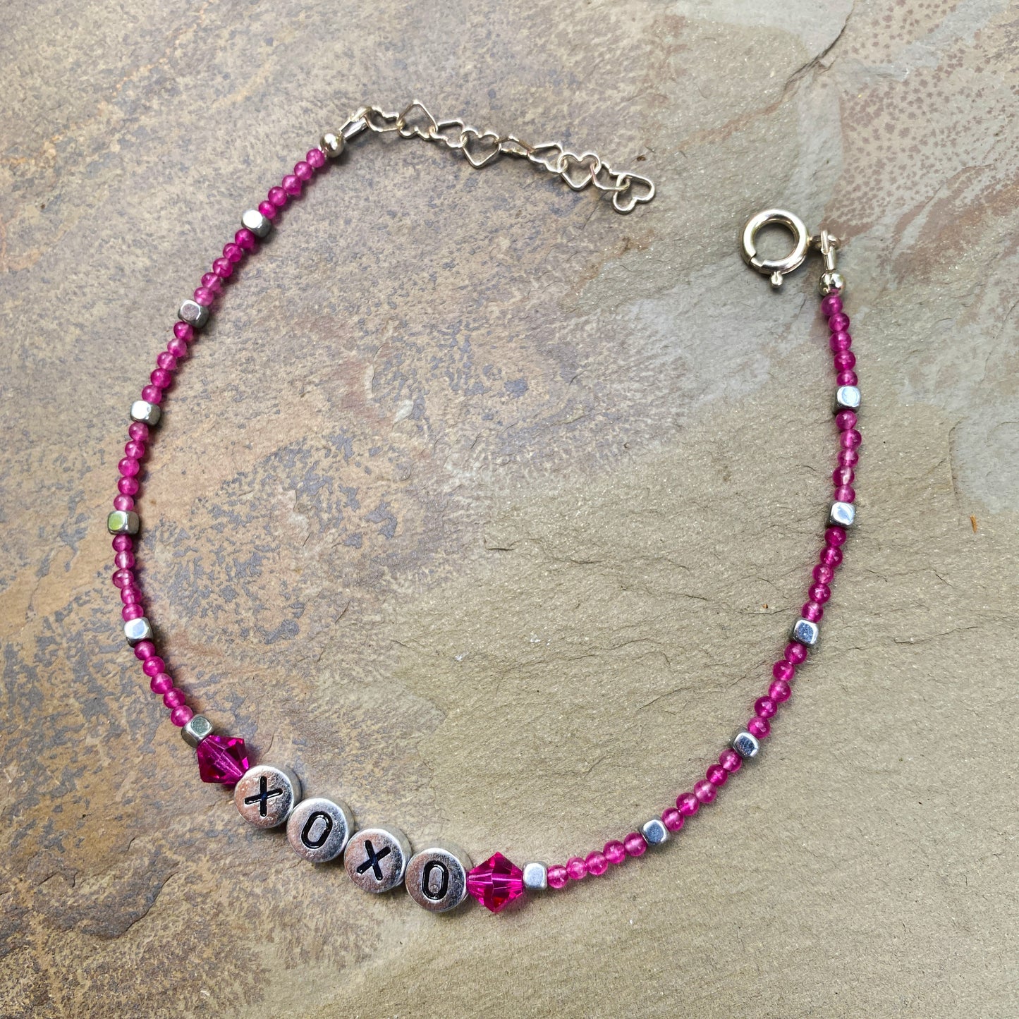 Pink agate, hematite, and Swarovski Crystal “xoxo” sterling silver anklet