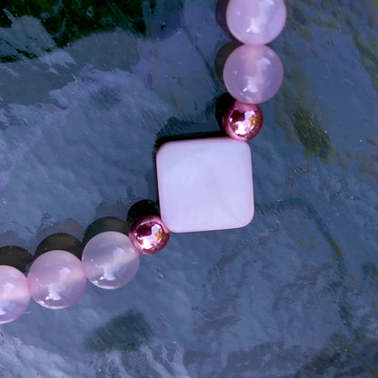 Women’s rose hematite, mother of pearl, and pink agate, “Curse” stretch bracelet