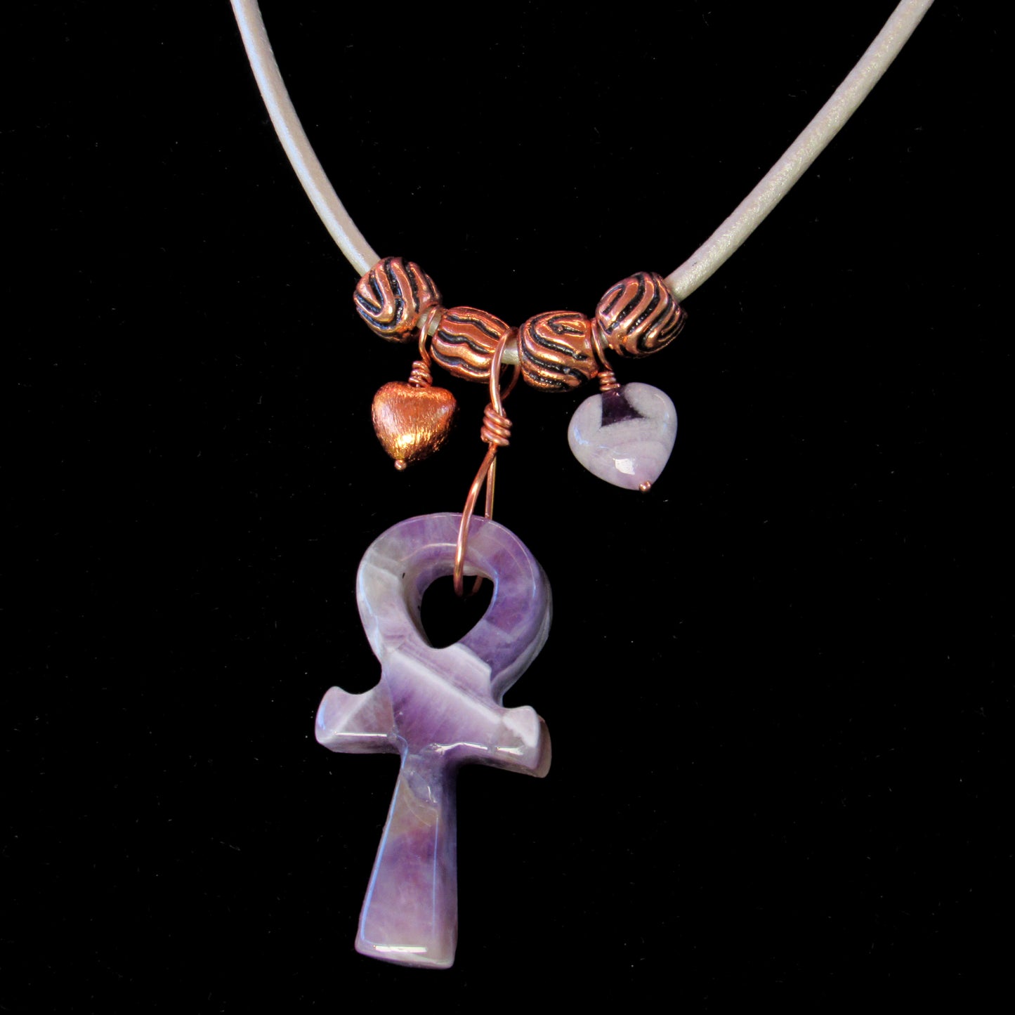 Amethyst gemstone carved Ankh pendant with copper on leather necklace
