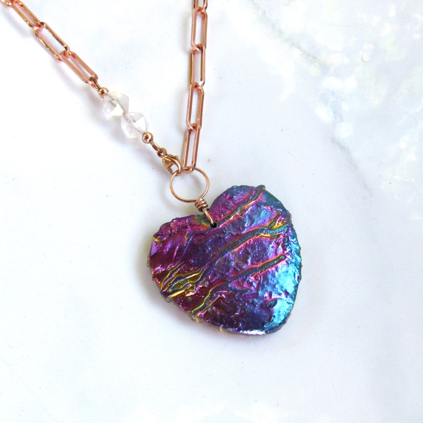 Crystal Heart coated Titanium, Pink Topaz gemstone, and 14Kt Rose Gold Fill